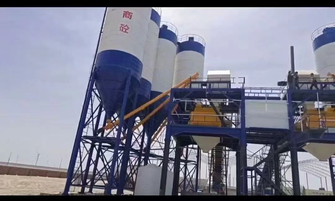 Technician dismantling HZS90 concrete plant mixer unit