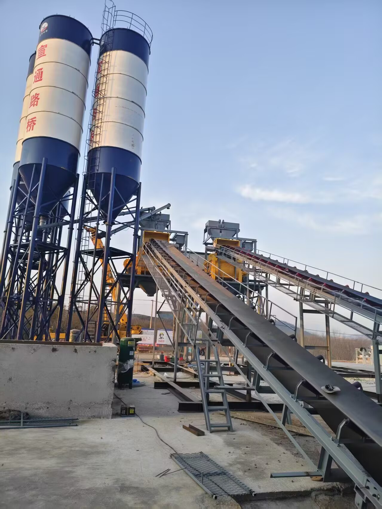 Professional concrete batching plant dismantling process showing structural disassembly