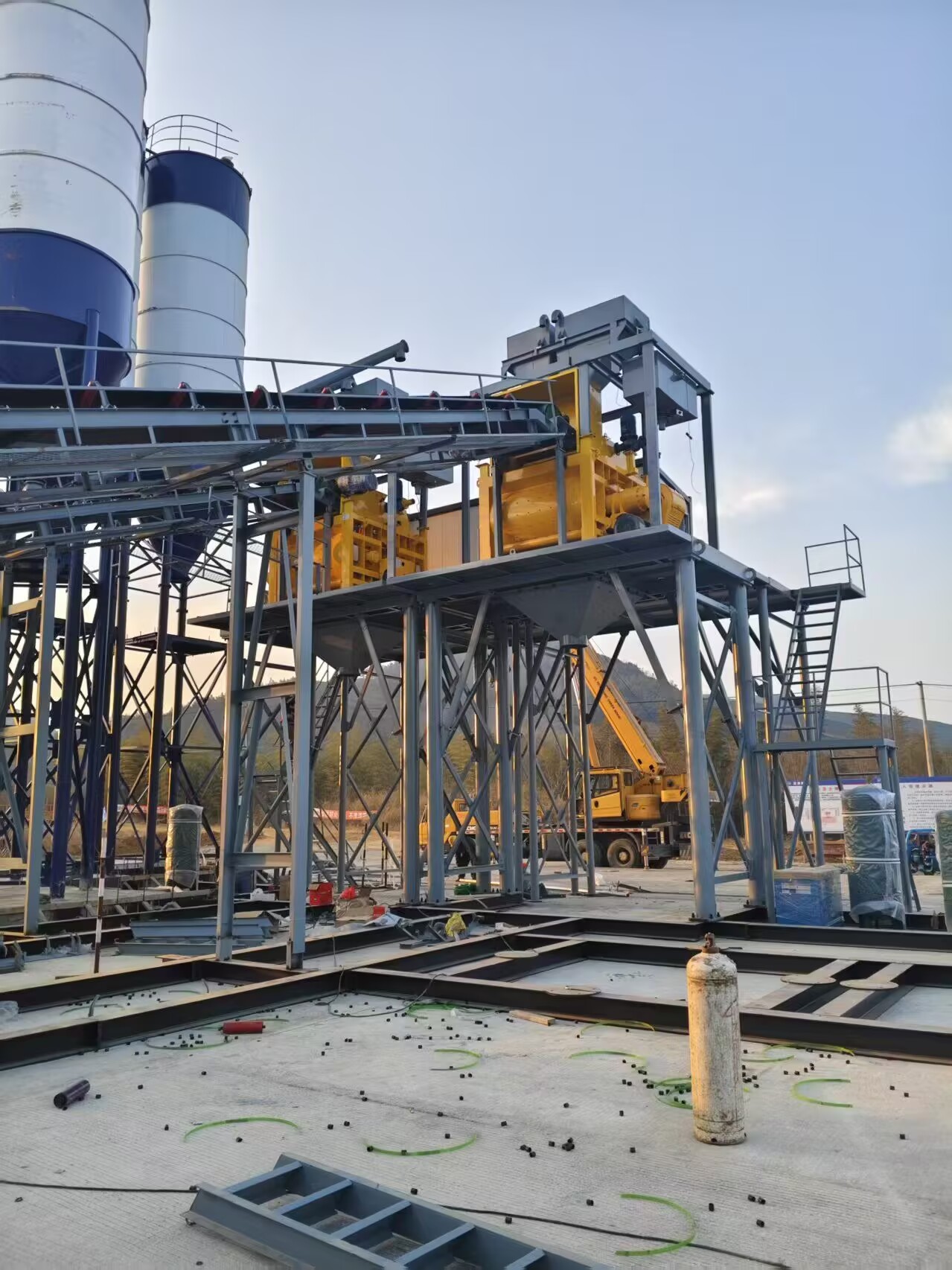 Concrete plant dismantling components organized and labeled for relocation
